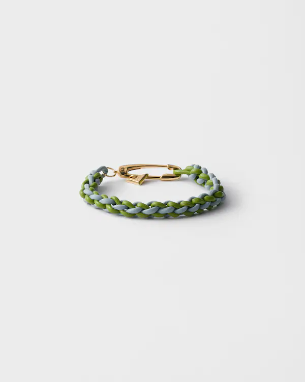 Pulseira de couro napa entrelaçado com ornamento metálico