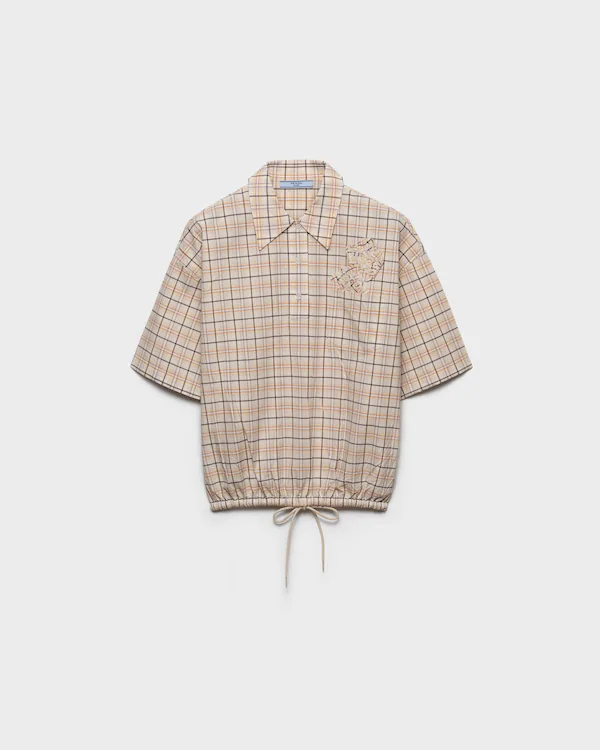 Blusa de popeline com estampa xadrez bordada
